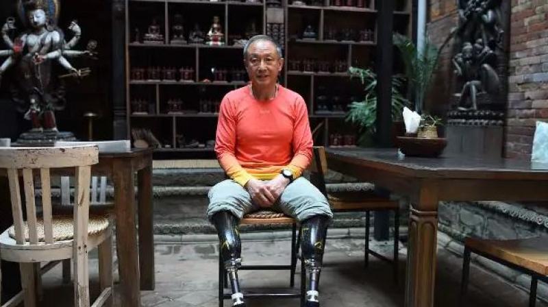 Xia's dream of standing at the top of the world was nearly thwarted by the Nepal government, which last year banned double amputee and blind climbers from summiting its mountains. (Photo: AFP) Xia's dream of standing at the top of the world was nearly thwarted by the Nepal government, which last year banned double amputee and blind climbers from summiting its mountains. (Photo: AFP)