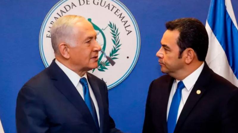 Israeli Prime Minister Benjamin Netanyahu (L) speaks with Guatemalan President Jimmy Morales ahead of the inauguration ceremony of Guatemala's embassy in Jerusalem. (Photo: AFP) Israeli Prime Minister Benjamin Netanyahu (L) speaks with Guatemalan President Jimmy Morales ahead of the inauguration ceremony of Guatemala's embassy in Jerusalem. (Photo: AFP)