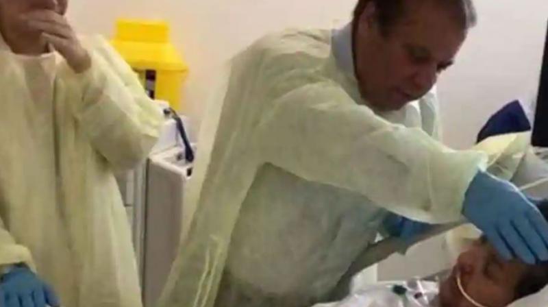 A visibly emotional Sharif can be seen talking to his unconscious wife in a London hospital before his return to Pakistan on July 12 to serve his 11-year jail term. (Photo: Video screengrab) A visibly emotional Sharif can be seen talking to his unconscious wife in a London hospital before his return to Pakistan on July 12 to serve his 11-year jail term. (Photo: Video screengrab)