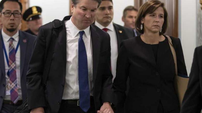 Supreme Court nominee Brett Kavanaugh and his wife Ashley Estes Kavanaugh depart after testifying before the Senate Judiciary Committee on Capitol Hill in Washington, Sept. 27, 2018. (Photo: AP) Supreme Court nominee Brett Kavanaugh and his wife Ashley Estes Kavanaugh depart after testifying before the Senate Judiciary Committee on Capitol Hill in Washington, Sept. 27, 2018. (Photo: AP)