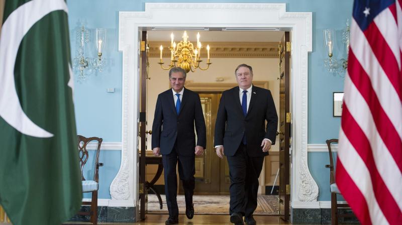 Secretary of State Mike Pompeo, right, meets Pakistani Foreign Minister Makhdoom Shah Mahmood Qureshi at the State Department in Washington, Tuesday, Oct. 2, 2018. (Photo | AP) Secretary of State Mike Pompeo, right, meets Pakistani Foreign Minister Makhdoom Shah Mahmood Qureshi at the State Department in Washington, Tuesday, Oct. 2, 2018. (Photo | AP)