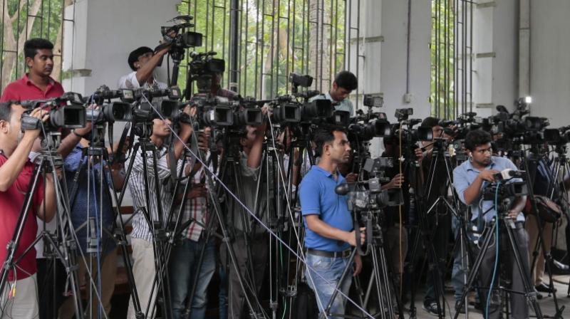 Mediapersons are particularly concerned about a provision in the law under which journalists can be convicted of espionage for entering a government office and gathering information secretly using electronic device -- an offence that would carry a 14-year jail sentence. (Photo: AP) Mediapersons are particularly concerned about a provision in the law under which journalists can be convicted of espionage for entering a government office and gathering information secretly using electronic device -- an offence that would carry a 14-year jail sentence. (Photo: AP)