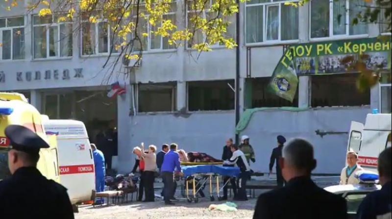 Rescuers carry an injured victim of a blast at at a college in the city of Kerch on October 17, 2018. - Thirteen people were killed and 50 more wounded, most of them teenagers, after a blast tore into a college canteen in Russian-annexed Crimea in what Moscow called a 'terrorist' attack. (Photo: AFP) Rescuers carry an injured victim of a blast at at a college in the city of Kerch on October 17, 2018. - Thirteen people were killed and 50 more wounded, most of them teenagers, after a blast tore into a college canteen in Russian-annexed Crimea in what Moscow called a 'terrorist' attack. (Photo: AFP)