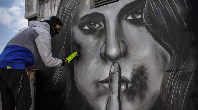 Graffiti art inspired by the increase in cases of domestic violence amid a lockdown aimed at curbing the spread of the COVID-19 pandemic. (AFP) Graffiti art inspired by the increase in cases of domestic violence amid a lockdown aimed at curbing the spread of the COVID-19 pandemic. (AFP)