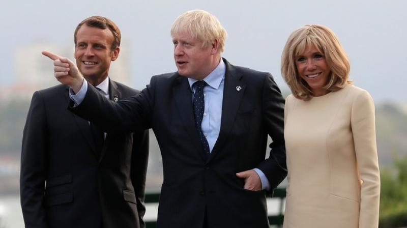 British Prime Minister Boris Johnson and EU Council President Donald Tusk exchanged accusations at the G7 summit Saturday over who will be to blame if Britain crashes out the bloc without an accord. (Photo: AP) British Prime Minister Boris Johnson and EU Council President Donald Tusk exchanged accusations at the G7 summit Saturday over who will be to blame if Britain crashes out the bloc without an accord. (Photo: AP)