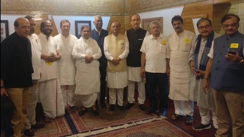 The delegation of Opposition leaders detained at Srinagar Airport. (Twitter/ @INC) The delegation of Opposition leaders detained at Srinagar Airport. (Twitter/ @INC)
