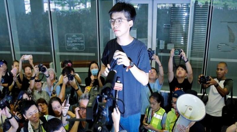 Leading pro-democracy activist Joshua Wong was arrested by Hong Kong police on Friday morning, his political organisation Demosisto said, ahead of another week of planned protests in the semi-autonomous region. (Photo: ANI) Leading pro-democracy activist Joshua Wong was arrested by Hong Kong police on Friday morning, his political organisation Demosisto said, ahead of another week of planned protests in the semi-autonomous region. (Photo: ANI)