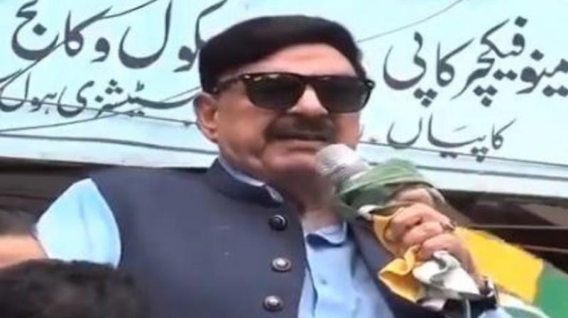 Pakistan Railway Minister Sheikh Rashid Ahmed on Friday got an electric shock while criticising Prime Minister Narendra Modi at an Islamabad rally, organised against India's move to end special status to Jammu and Kashmir. (Photo: Twitter/ video screengrab) Pakistan Railway Minister Sheikh Rashid Ahmed on Friday got an electric shock while criticising Prime Minister Narendra Modi at an Islamabad rally, organised against India's move to end special status to Jammu and Kashmir. (Photo: Twitter/ video screengrab)