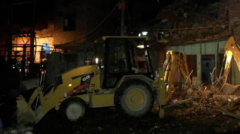 Two people lost their lives while three others were injured in the building collapse in Seelampur area of North-East Delhi, National Disaster Response Force (NDRF) Inspector Balwan said on Tuesday. (Photo: Twitter/ ANI) Two people lost their lives while three others were injured in the building collapse in Seelampur area of North-East Delhi, National Disaster Response Force (NDRF) Inspector Balwan said on Tuesday. (Photo: Twitter/ ANI)