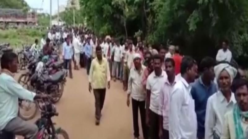 A 69-year-old farmer died here on Thursday after suffering a heart attack while he was standing in a queue for collecting urea which was being distributed by the agricultural department. (Photo: ANI) A 69-year-old farmer died here on Thursday after suffering a heart attack while he was standing in a queue for collecting urea which was being distributed by the agricultural department. (Photo: ANI)