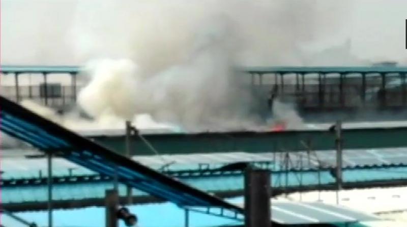 A fire broke out in the rear power car of the Chandigarh-Kochuvalli Express as it was departing the New Delhi station on Friday, a railway spokesperson said. (Photo: Twitter/ ANI) A fire broke out in the rear power car of the Chandigarh-Kochuvalli Express as it was departing the New Delhi station on Friday, a railway spokesperson said. (Photo: Twitter/ ANI)