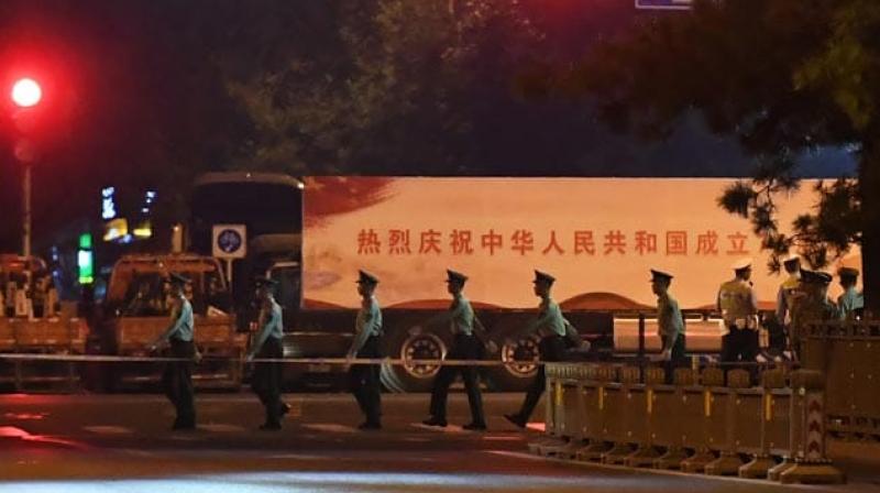 The centre of Beijing was under lockdown early Sunday for a night-time parade rehearsal by the Chinese military which is preparing for October 1 ceremonies to mark Communist China's 70th anniversary. (Photo: AFP) The centre of Beijing was under lockdown early Sunday for a night-time parade rehearsal by the Chinese military which is preparing for October 1 ceremonies to mark Communist China's 70th anniversary. (Photo: AFP)