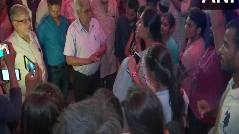 Students of Banaras Hindu University (BHU) on Saturday protested against the alleged reinstatement of suspended Professor S K Chaube, who has been accused of molesting a girl student. (Photo: ANI) Students of Banaras Hindu University (BHU) on Saturday protested against the alleged reinstatement of suspended Professor S K Chaube, who has been accused of molesting a girl student. (Photo: ANI)