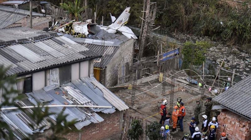 At least seven people were killed and another three injured when a small plane crashed in southwestern Colombia on Sunday, a firefighter said. (Photo: AFP) At least seven people were killed and another three injured when a small plane crashed in southwestern Colombia on Sunday, a firefighter said. (Photo: AFP)