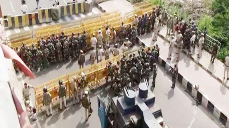 Security has been beefed up with barricades put across the roads to stop protesting farmers from reaching national capital from the adjoining Uttar Pradesh on Saturday at East Delhi's Ghazipur border. (Photo: File) Security has been beefed up with barricades put across the roads to stop protesting farmers from reaching national capital from the adjoining Uttar Pradesh on Saturday at East Delhi's Ghazipur border. (Photo: File)
