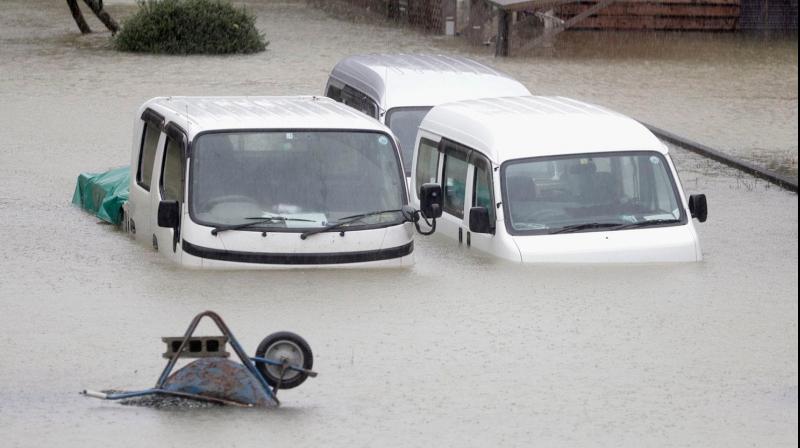 Japan's military scrambled Sunday to rescue people trapped by flooding in the aftermath of powerful Typhoon Hagibis, which killed at least eleven people, caused landslides and burst rivers. (Photo: AP) Japan's military scrambled Sunday to rescue people trapped by flooding in the aftermath of powerful Typhoon Hagibis, which killed at least eleven people, caused landslides and burst rivers. (Photo: AP)