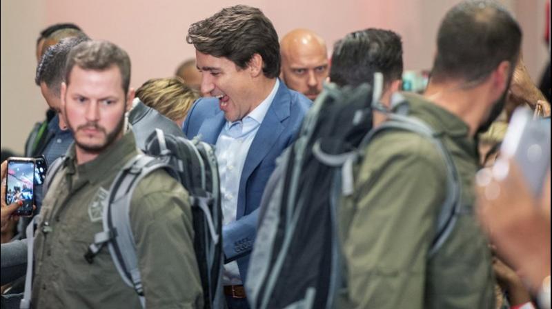 Canadian Prime Minister Justin Trudeau donned an armored vest and appeared with a heavy security detail at a major election rally on Saturday. (Photo: AP) Canadian Prime Minister Justin Trudeau donned an armored vest and appeared with a heavy security detail at a major election rally on Saturday. (Photo: AP)