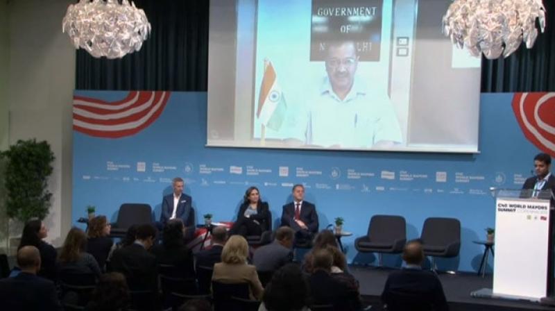 Kejriwal could not attend the C-40 Climate Summit in Denmark on October 11 after the Ministry of External Affairs refused political clearance to his visit. He addressed it through video link. (Photo: YouTube screengrab/ C40CitiesLive) Kejriwal could not attend the C-40 Climate Summit in Denmark on October 11 after the Ministry of External Affairs refused political clearance to his visit. He addressed it through video link. (Photo: YouTube screengrab/ C40CitiesLive)