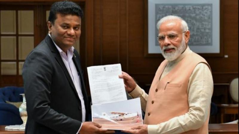 Maharashtra pilot Amol Yadav, who had got a Rs 35,000 crore deal for India's first plane factory last year, met Prime Minister Narendra Modi on Sunday. (Photo: Twitter/ ANI) Maharashtra pilot Amol Yadav, who had got a Rs 35,000 crore deal for India's first plane factory last year, met Prime Minister Narendra Modi on Sunday. (Photo: Twitter/ ANI)