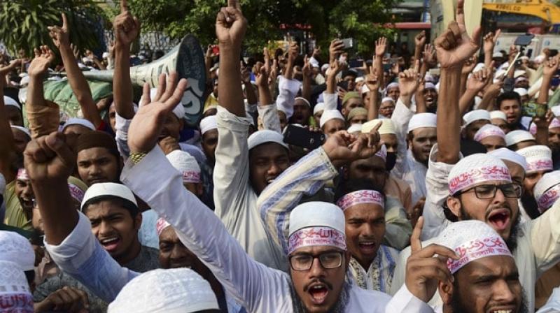 Thousands protested against police across Bangladesh on Monday, a day after at least four people died when officers fired on a crowd in one of the country's deadliest religious riots to date. (Photo: AFP) Thousands protested against police across Bangladesh on Monday, a day after at least four people died when officers fired on a crowd in one of the country's deadliest religious riots to date. (Photo: AFP)