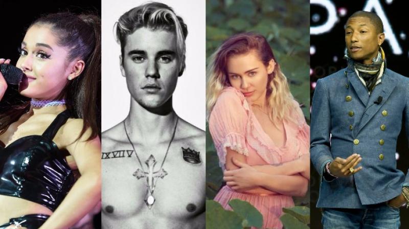 Ariana Grande, Justin Bieber, Miley Cyrus and Pharrell Williams. Ariana Grande, Justin Bieber, Miley Cyrus and Pharrell Williams.