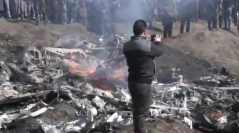 The IAF’s MI-17 crashed in an open field near Garend Kalaan village, 7-km way from the district headquarters of Budgam, at 10.05 am, the officials said. (Photo: ANI) The IAF’s MI-17 crashed in an open field near Garend Kalaan village, 7-km way from the district headquarters of Budgam, at 10.05 am, the officials said. (Photo: ANI)