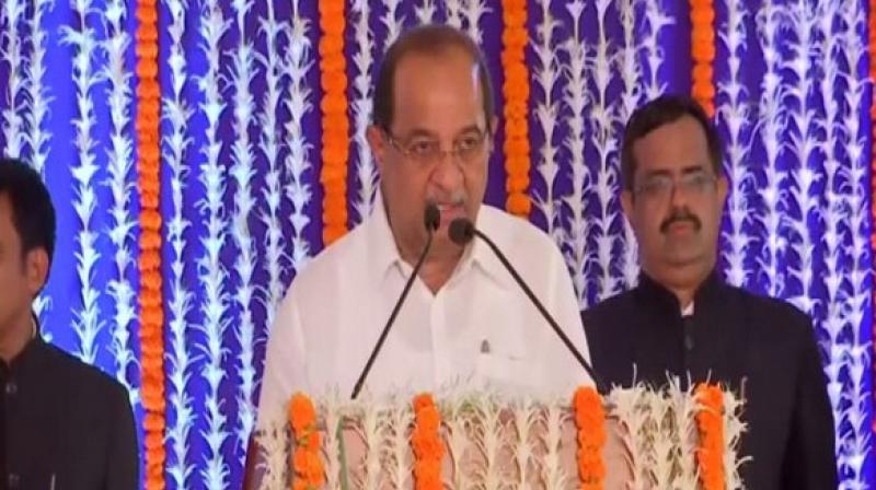 Radhakrishna Vikhe Patil, who quit Congress recently, was sworn-in as a Cabinet minister at Raj Bhavan here. (Photo: ANI) Radhakrishna Vikhe Patil, who quit Congress recently, was sworn-in as a Cabinet minister at Raj Bhavan here. (Photo: ANI)