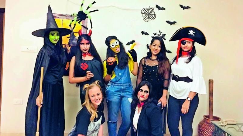 Visala Kantamneni dressed as an evil witch along with her friends. Visala Kantamneni dressed as an evil witch along with her friends.