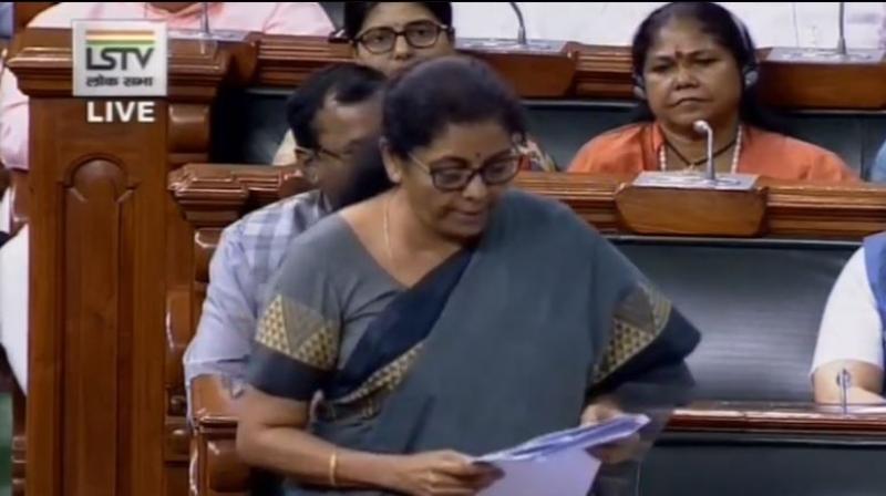 Finance Minister referred to the government setting fiscal deficit target of 3.3 per cent from an earlier 3.4 per cent and said there should be no anxiety. (Photo: ANI) Finance Minister referred to the government setting fiscal deficit target of 3.3 per cent from an earlier 3.4 per cent and said there should be no anxiety. (Photo: ANI)