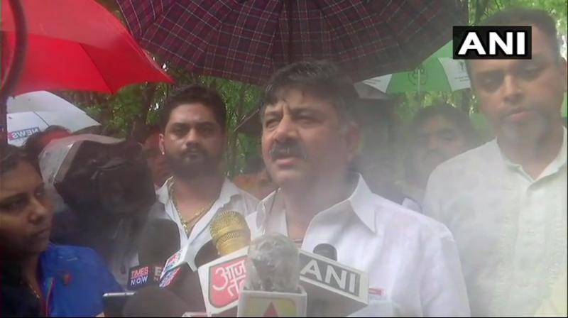 The police is now taking Shivakumar to the airport where he will board a plane back to Bengaluru. (Photo: ANI) The police is now taking Shivakumar to the airport where he will board a plane back to Bengaluru. (Photo: ANI)