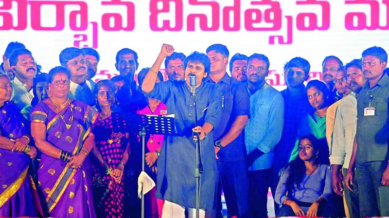 Jana Sena president Pawan Kalyan addresses during party anniversary in front of Acharya Nagarjuna University, near Kaza village of Guntur district on Wednesday.(Photo: E. TEJO ROY) Jana Sena president Pawan Kalyan addresses during party anniversary in front of Acharya Nagarjuna University, near Kaza village of Guntur district on Wednesday.(Photo: E. TEJO ROY)