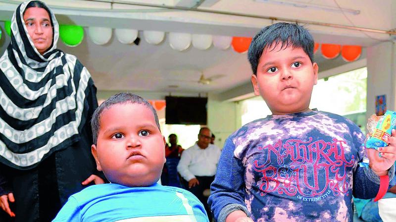 Two year-old Sk.Tabish (Wt: 32 kg) and five-year-old Sk. Sufia (Wt 42 kg) suffer from leptin deficiency and seek government’s help for treatment. (Photo: DC) Two year-old Sk.Tabish (Wt: 32 kg) and five-year-old Sk. Sufia (Wt 42 kg) suffer from leptin deficiency and seek government’s help for treatment. (Photo: DC)