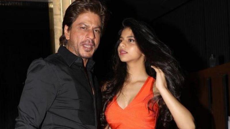 Shah Rukh and Suhana Khan at an event. Shah Rukh and Suhana Khan at an event.