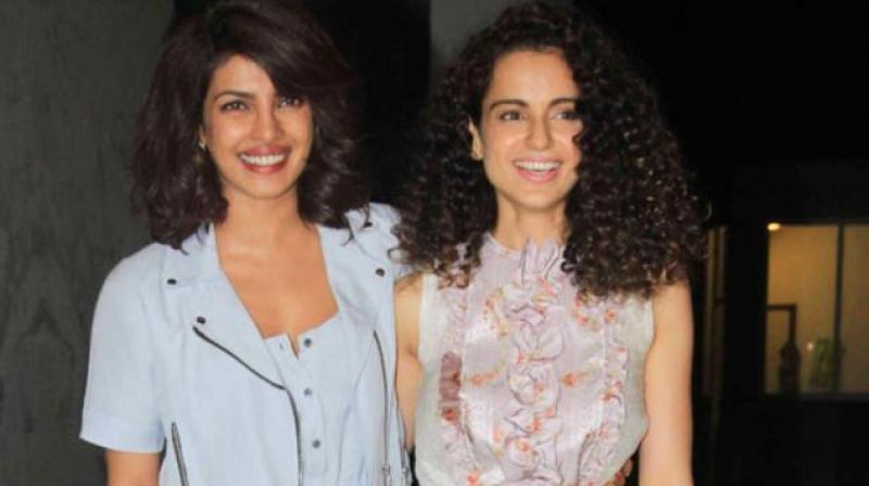 Priyanka Chopra and Kangana Ranaut celebrating together. Priyanka Chopra and Kangana Ranaut celebrating together.