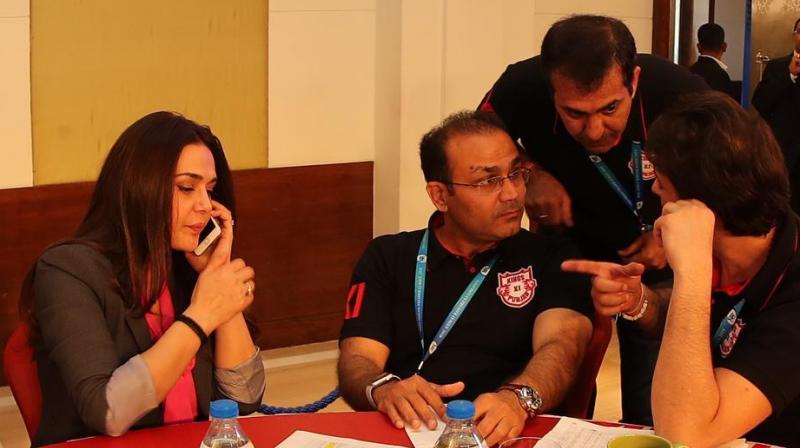 It was reported that Kings XI Punjab co-owner Preity Zinta approached former Team India opener and KXIP mentor Virender Sehwag as soon as the match against Rajasthan Royals got over and even before the players were back in the dressing room. She was not happy with the tactics and it apparently led to an altercation. (Photo: BCCI) It was reported that Kings XI Punjab co-owner Preity Zinta approached former Team India opener and KXIP mentor Virender Sehwag as soon as the match against Rajasthan Royals got over and even before the players were back in the dressing room. She was not happy with the tactics and it apparently led to an altercation. (Photo: BCCI)