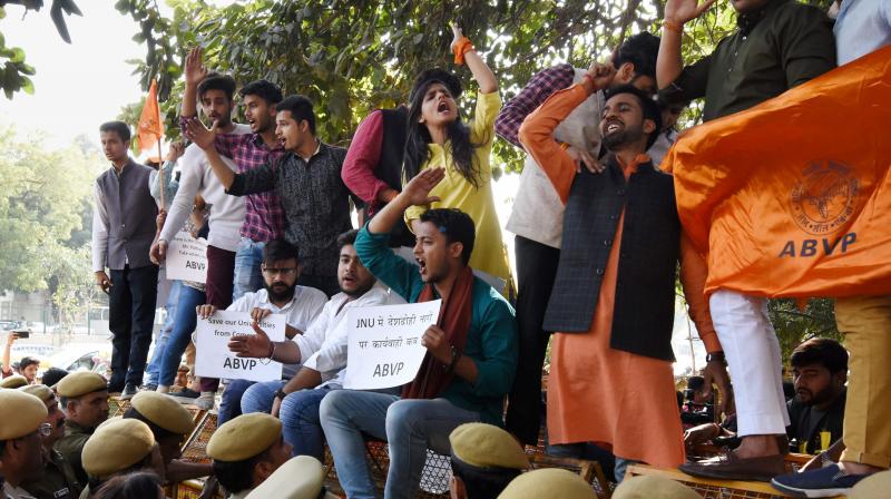 Akhil Bharatiya Vidyarthi Parishad (ABVP) activists during a protest against Delhi Police at Police headquarters in New Delhi on Wednesday. The activists alleged that appropriate action was not taken in the JNU's 'anti-India' slogans case. (Photo: PTI) Akhil Bharatiya Vidyarthi Parishad (ABVP) activists during a protest against Delhi Police at Police headquarters in New Delhi on Wednesday. The activists alleged that appropriate action was not taken in the JNU's 'anti-India' slogans case. (Photo: PTI)