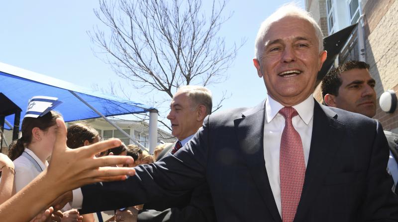 Prime Minister of Israel Benjamin Netanyahu, center, and Australia's Prime Minister Malcolm Turnbull, right, meet student during a visit the Moriah War Memorial College in Sydney. (Photo: AP) Prime Minister of Israel Benjamin Netanyahu, center, and Australia's Prime Minister Malcolm Turnbull, right, meet student during a visit the Moriah War Memorial College in Sydney. (Photo: AP)