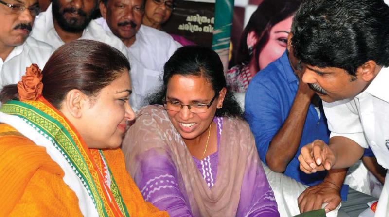 Kozhikode DCC president T. Siddique intervenes while AICC spokeperson and actor Kushboo having a word with RMP leader K.K Rema at a protest meet organised by DCC on Wednesday. (Photo: VENUGOPAL) Kozhikode DCC president T. Siddique intervenes while AICC spokeperson and actor Kushboo having a word with RMP leader K.K Rema at a protest meet organised by DCC on Wednesday. (Photo: VENUGOPAL)