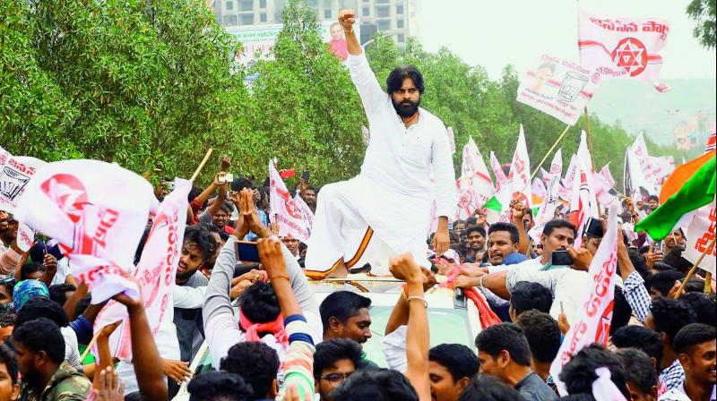 Jana Sena chief Pawan Kalyan gestures at his supporters during a rally on his way to file his nomination from the Gajuwaka Assembly constituency in Visakhapatnam on Thursday. (Murali Krishna) Jana Sena chief Pawan Kalyan gestures at his supporters during a rally on his way to file his nomination from the Gajuwaka Assembly constituency in Visakhapatnam on Thursday. (Murali Krishna)