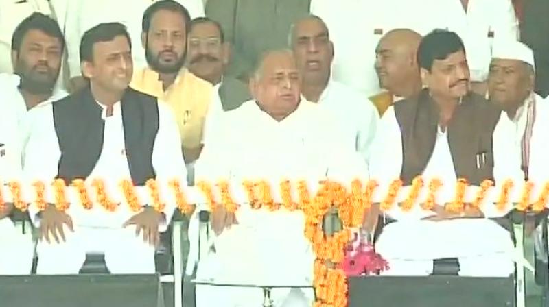 UP Chief Minister and Mulayam Singh Yadav at hte venue of ‘Vikas Rath Yatra’ (Photo: Twitter) UP Chief Minister and Mulayam Singh Yadav at hte venue of ‘Vikas Rath Yatra’ (Photo: Twitter)