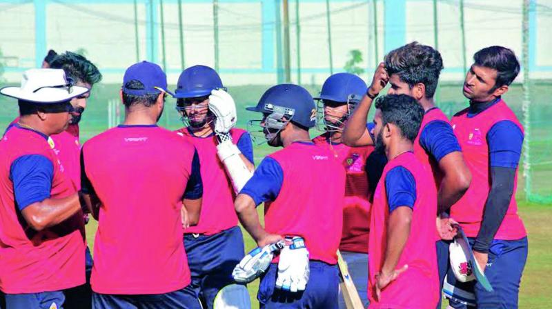 Mumbai coach Chandrakant Pandit (left) talks to his players ahead of their nets session on Saturday. Mumbai coach Chandrakant Pandit (left) talks to his players ahead of their nets session on Saturday.