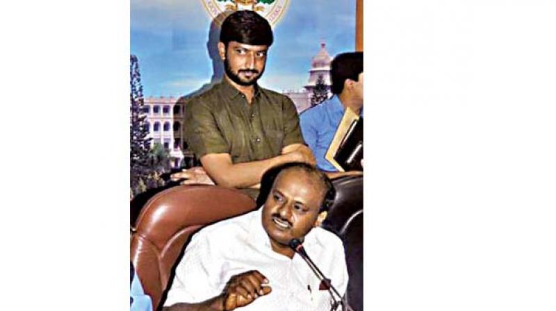 Sharangouda Patil, son of JD(S) MLA Nagangouda Kandakur, with Chief Minister Kumaraswamy in this file photo Sharangouda Patil, son of JD(S) MLA Nagangouda Kandakur, with Chief Minister Kumaraswamy in this file photo