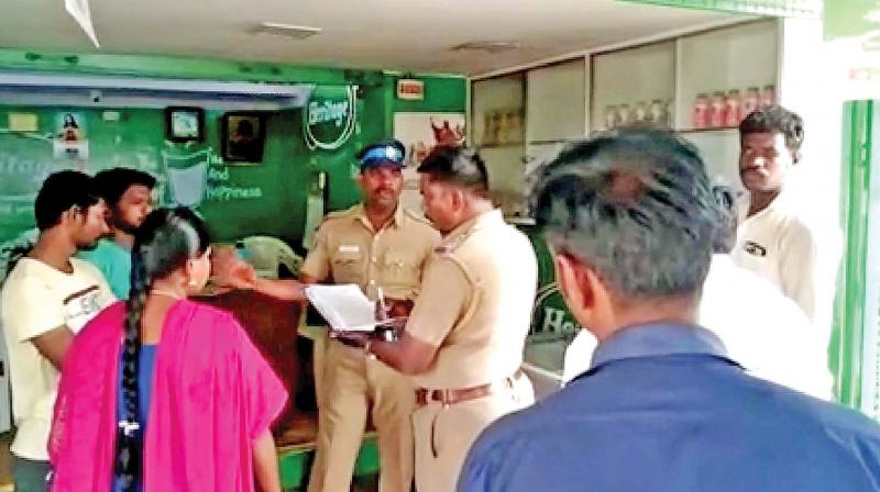 Sources said, at around 2 pm, a man in his early 30s hurled two bottles of petrol bomb inside the shop However, the employees could not identify the perpetrator of the crime. Sources said, at around 2 pm, a man in his early 30s hurled two bottles of petrol bomb inside the shop However, the employees could not identify the perpetrator of the crime.