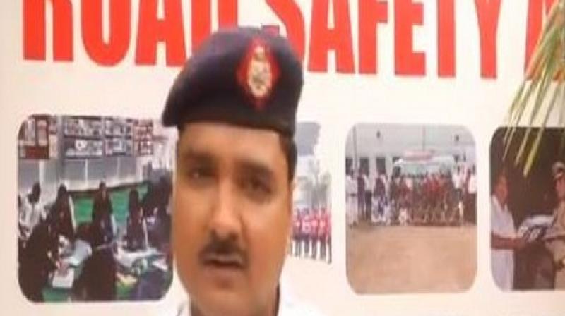 The cop also buys helmets from his own pocket and gifts it to others. Till date, he has circulated around 700 helmets to people. (Photo: ANI | Twitter) The cop also buys helmets from his own pocket and gifts it to others. Till date, he has circulated around 700 helmets to people. (Photo: ANI | Twitter)