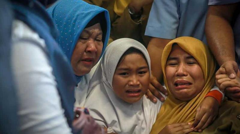 Family members of the crashed Indonesian Lion Air JT-610 react at Pangkal Pinang airport, in Bangka Belitung province on October 29, 2018. - An Indonesian Lion Air plane carrying 188 passengers and crew crashed into the sea on October 29, 2018, officials said, moments after it had asked to be allowed to return to Jakarta. (Photo: AFP) Family members of the crashed Indonesian Lion Air JT-610 react at Pangkal Pinang airport, in Bangka Belitung province on October 29, 2018. - An Indonesian Lion Air plane carrying 188 passengers and crew crashed into the sea on October 29, 2018, officials said, moments after it had asked to be allowed to return to Jakarta. (Photo: AFP)