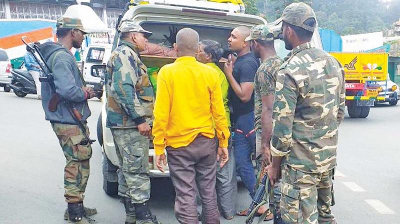 Every vehicle entering the hills is checked and tourist spots like botanical garden on guard with more pickets. Every vehicle entering the hills is checked and tourist spots like botanical garden on guard with more pickets.