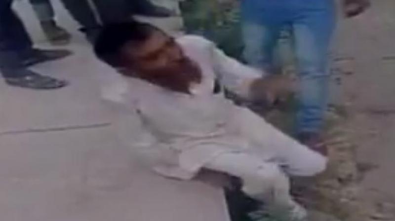 A video showing how the men were dragged out of their truck and thrashed went viral. (Photo: Videograb) A video showing how the men were dragged out of their truck and thrashed went viral. (Photo: Videograb)