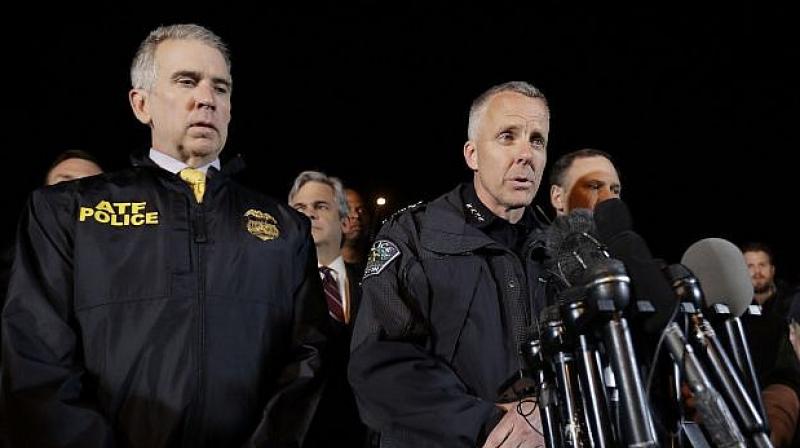 When members of the SWAT team approached, the suspect detonated an explosive device inside the vehicle, the police chief said. The blast knocked back one officer, while a second officer fired his weapon, Manley said. (Photo: AP) When members of the SWAT team approached, the suspect detonated an explosive device inside the vehicle, the police chief said. The blast knocked back one officer, while a second officer fired his weapon, Manley said. (Photo: AP)