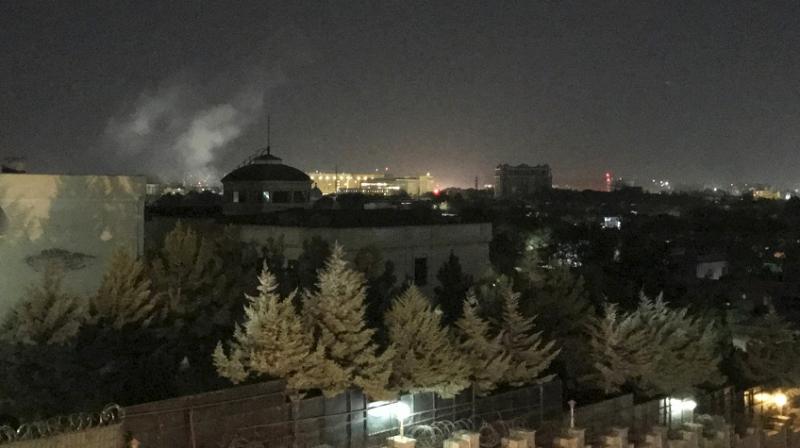 A plume of smoke rose over central Kabul shortly after midnight and sirens could be heard. (Photo: AP) A plume of smoke rose over central Kabul shortly after midnight and sirens could be heard. (Photo: AP)