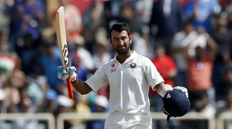 Cheteshwar Pujara has reason to celebrate as his knock of 202 has helped him gain four slots to reach a career-best second ranking with 861 points. (Photo: AP) Cheteshwar Pujara has reason to celebrate as his knock of 202 has helped him gain four slots to reach a career-best second ranking with 861 points. (Photo: AP)